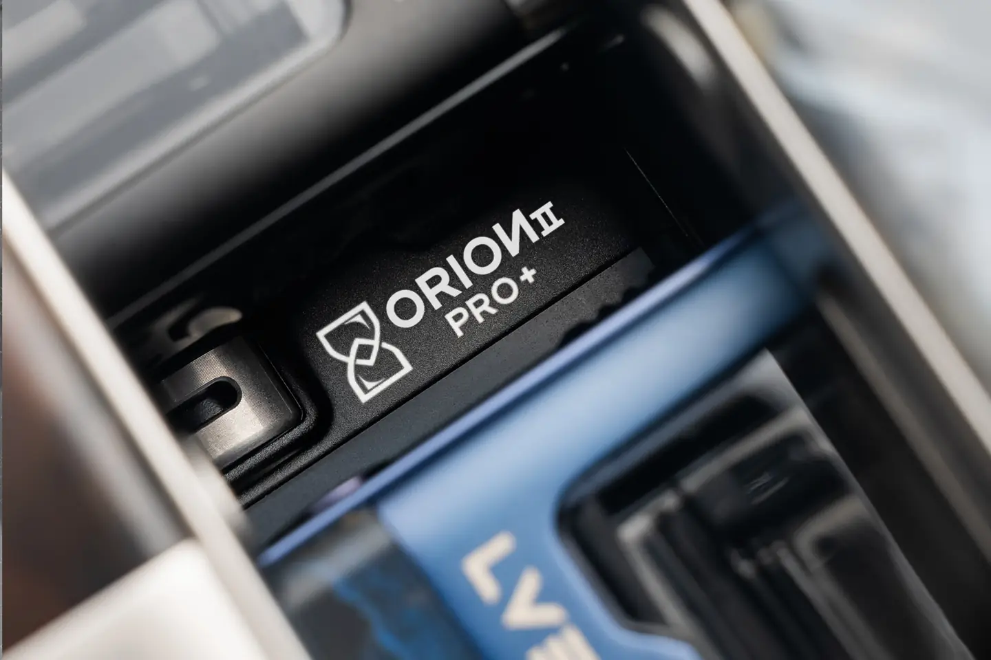 Close product study of the ORION II PRO+ engraved nameplate and LVE mark