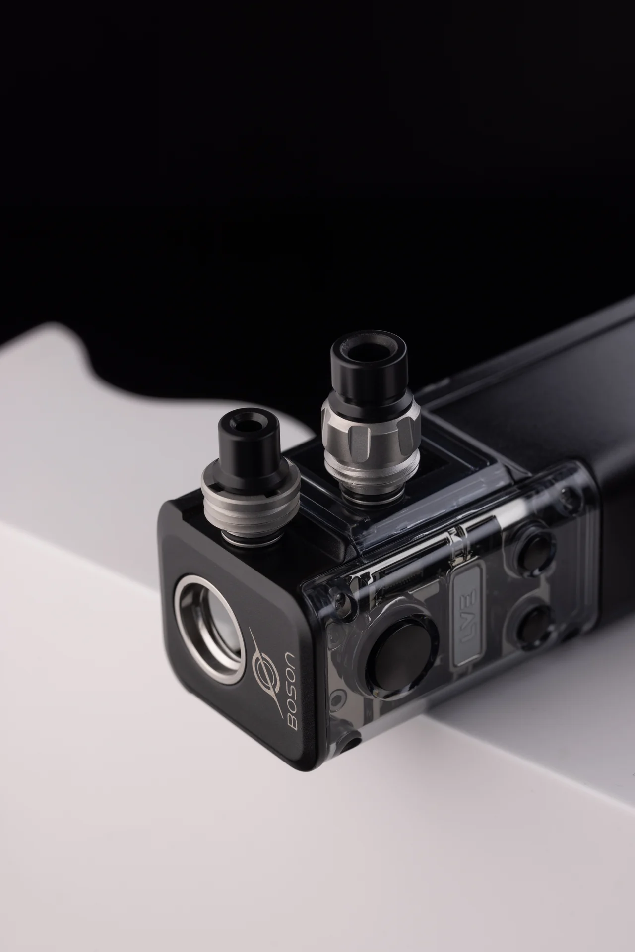 Close product view of the BOSON DNA80C Boro platform, showing the drip tips and adjustable connection area
